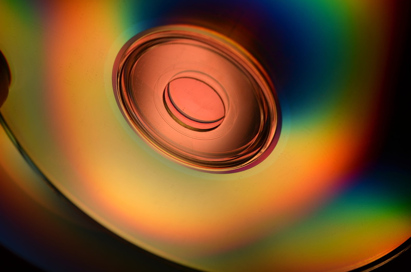 4K, full frame, illuminated, camera - photographic equipment, data, indoors, disk, bubble, operating system, shape, orange, technology, green, network