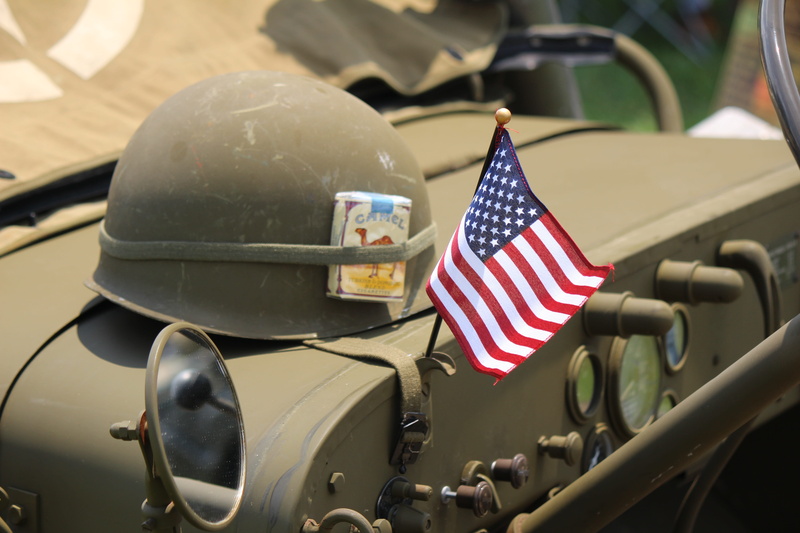 saluting, military, vehicle, independence, outdoors, star shape, helmet, american flag, memorial, about us icon, patriotic, patriotism, striped, pride