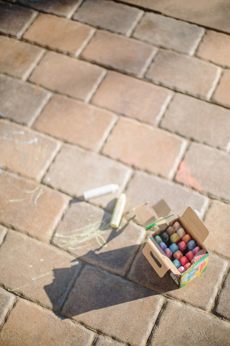 tiled floor, capsule, summer, high angle view, game, furniture, no people, outdoors, rubix cube, multi colored, dice, cabinet, medication, art and craft