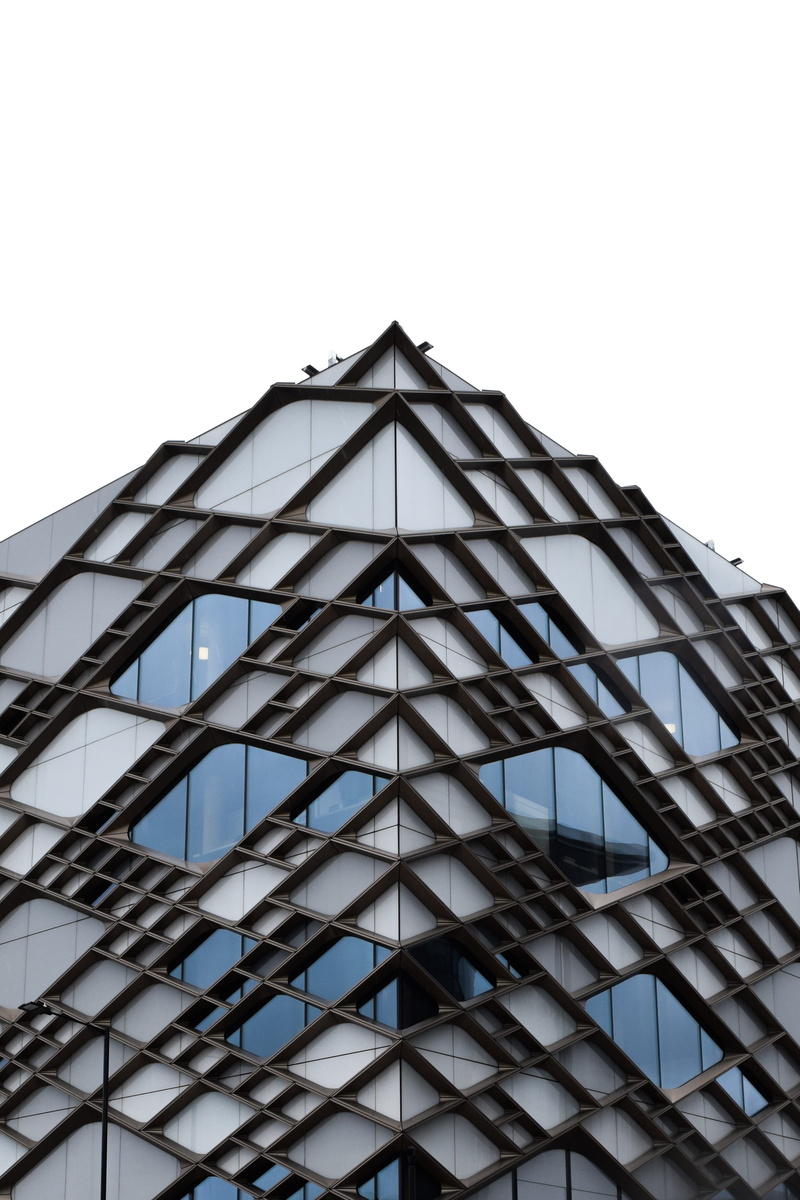 sphere, glass - material, outdoors, office building, skylight, grey, droplet, glass, windows, building exterior, blue, window, roof, triangle, low angle view