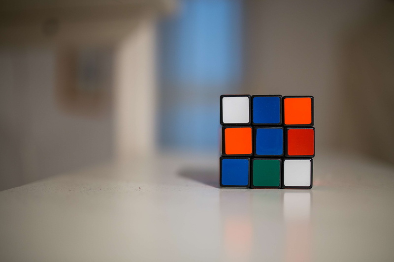 square, relaxation, technology, rubiks cube, shape, play, game, shadow, close-up, table, 4K, copy space, single object, block, creativity, conceptual