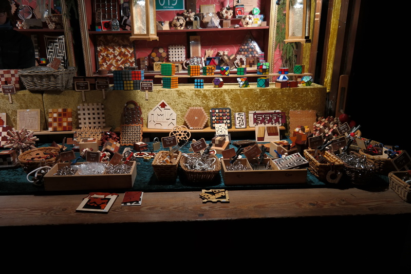 choice, high angle view, puzzle, stand, toys, collection, craft, christmas market, for sale, wood, creativity, large group of objects, consumerism, art and craft