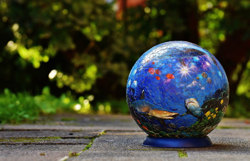 tricky, vulnerability, toys, environmental issues, street, no people, puzzle piece, day, ball, fragility, close-up, patience games, sphere, map, fun, shape