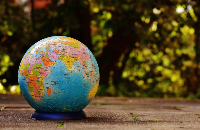 top, focus on foreground, brown, puzzle, planet earth, vulnerability, day, puzzle piece, puzzle ball, toys, shape, surface, environment, tricky, no people