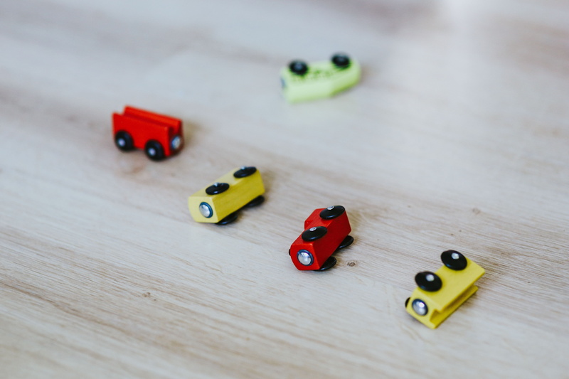 selective focus, dice, playing, table, ladybug, childhood, fun, indoors, yellow, choice, kid, close-up, car, on the floor, Child, red, high angle view