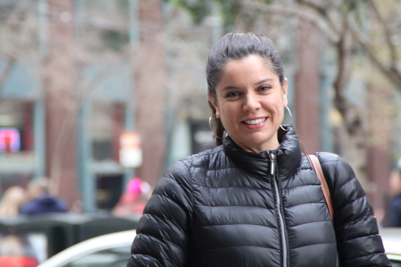 city, brunette, warm clothing, young adult, 5K, downtown, smiling, emotion, standing, salesforce, adult, united states, leather jacket, waist up, winter in san francisco