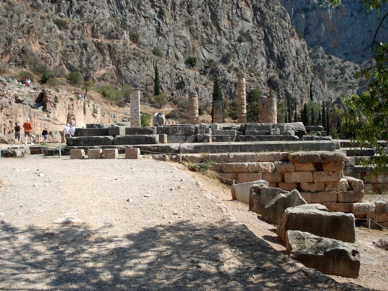 delphi, travel destinations, outdoors, travel, rock - object, greece, sunlight, built structure, history, solid, formation, mountain, the past, ancient