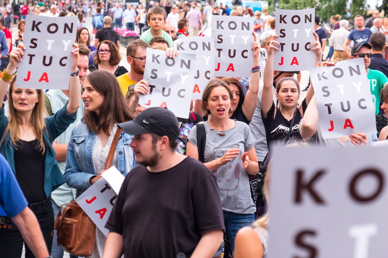 girl, protesting, holding, manifestation, women, young men, young women, adult, poland, conflict, young adult, real people, demonstration, poster, cheerful