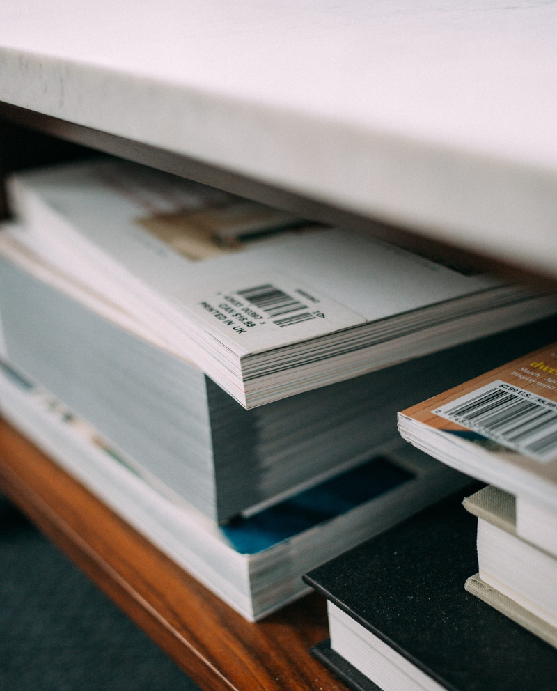 no people, business, still life, amazon, print, indoors, subscription, magazine, laptop, book, detail, computer, large group of objects, books, technology