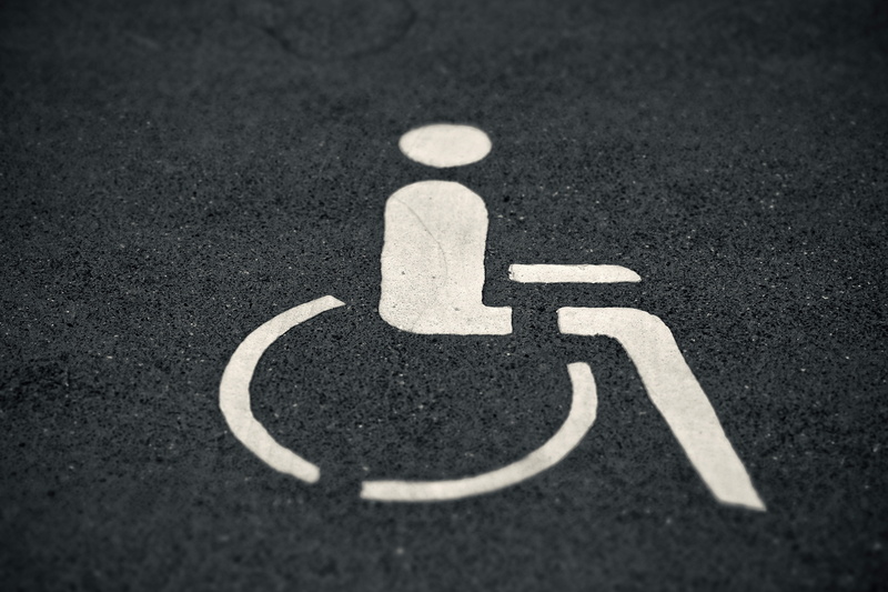 communication, medical equipment, ground, disabled parking space, park marker, disabled access, city, transportation, day, black, tar, high angle view