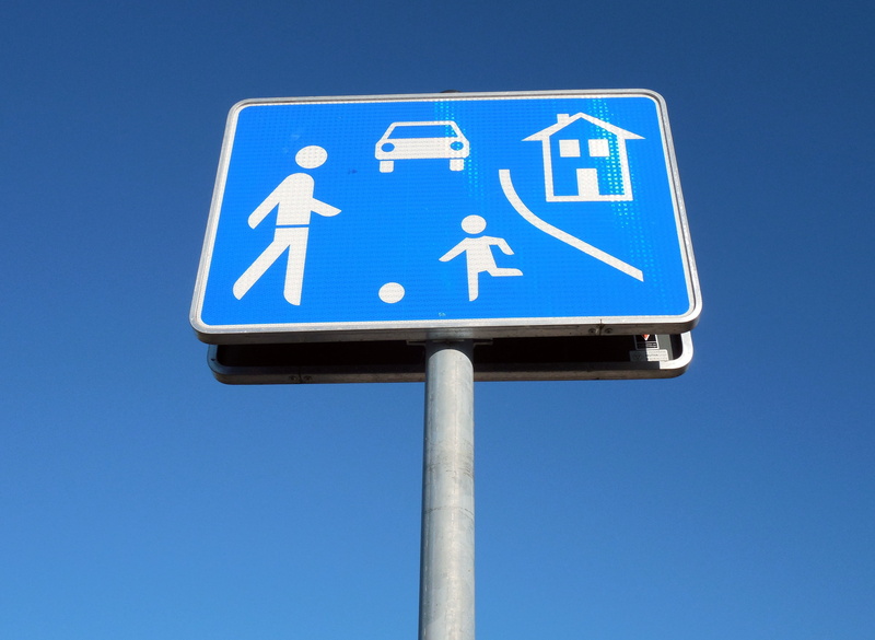 city, day, note, 2K, blue, guidance, road sign, human representation, play, shield, disabled access, blue background, children, symbol, sky, nature, communication
