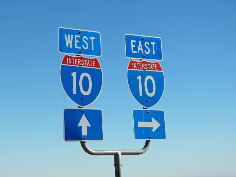 city, text, road, sunny, blue background, sky, road signs, arrow symbol, blue, sign, usa, transportation, interstate, disabled access, road Sign, street sign