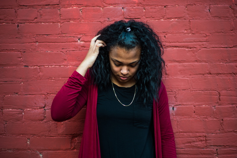 young adult, wall - building feature, beautiful woman, casual clothing, depression - sadness, looking down, bowing, woman, hair, urbanesk, black beauty