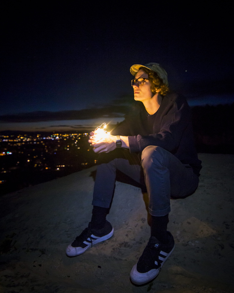 nature, man, leisure activity, illuminated, young women, glasses, young adult, looking up, real people, sitting, billings, sky, light, casual clothing