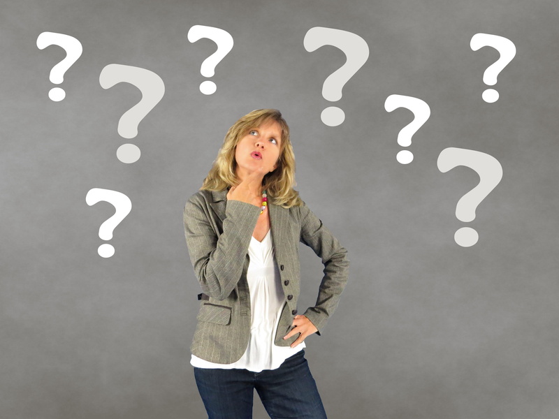young adult, blazer, confusion, looking at camera, choice, wearing, standing, blond hair, indoors, question mark, woman, thoughtful, adult, studio shot