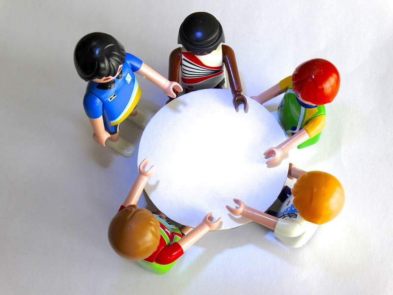 childhood, talk, figures, figs, togetherness, two people, high angle view, mini, creativity, studio shot, playing, conversation, indoors, group, real people