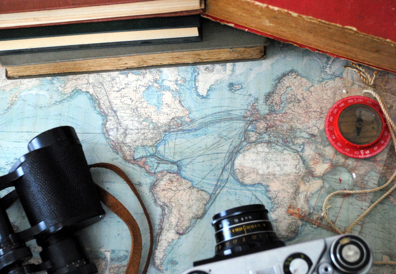 direction, art and craft, old-fashioned, 2K, work tool, angle, travel, wood - material, high, still life, no people, table, indoors, world map, binoculars