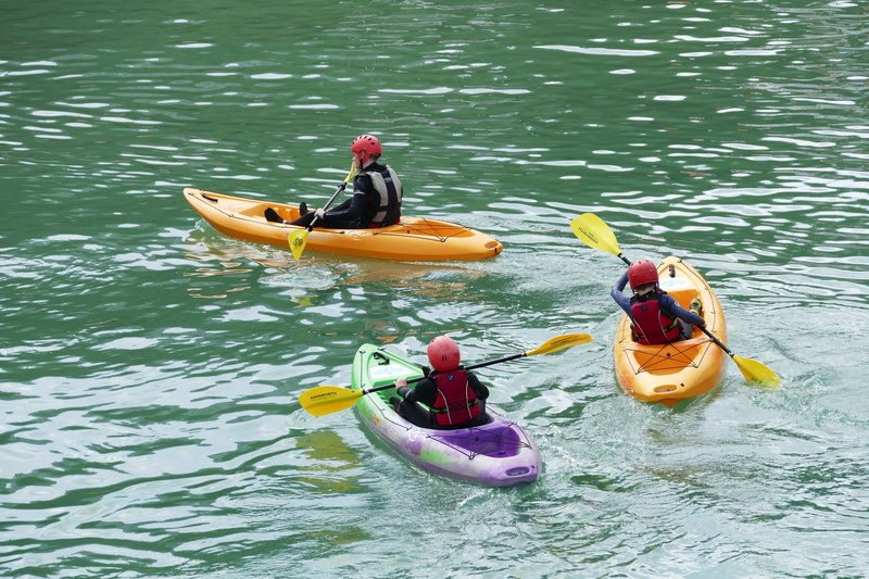 rowing, riding, tourist, row, high angle view, adventure, summer, togetherness, oar, life jacket, team, water, ocean, outdoors, paddle, sea, teamwork, travel