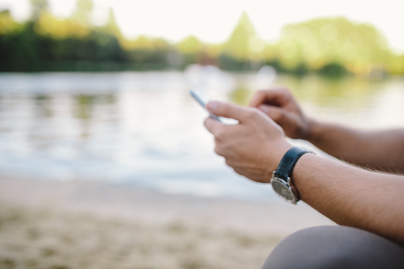 portable information device, text Messaging, holidays, watch, people, social networking, male, outdoor, iphone, internet, relaxation, typing, connection