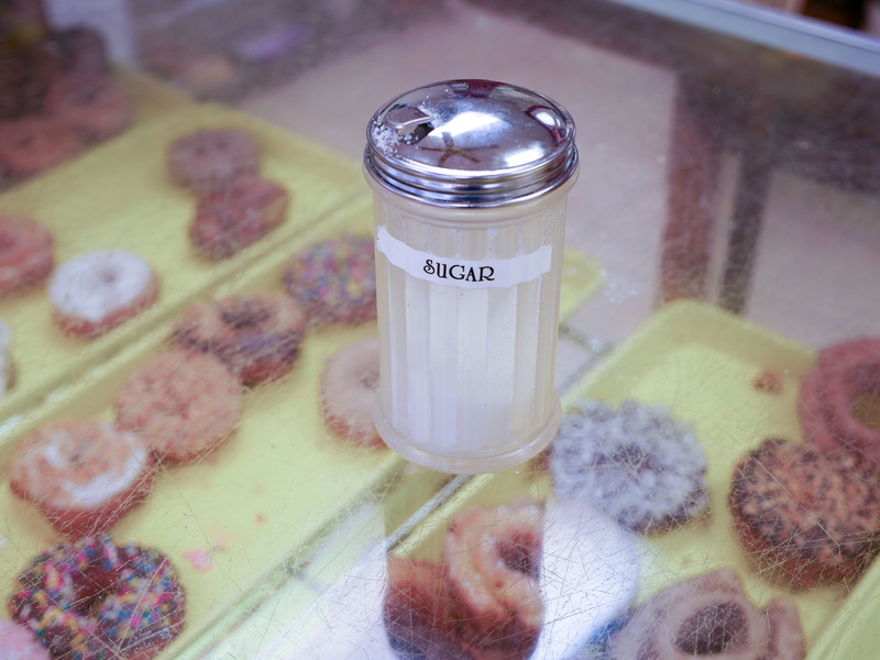 close-up, indoors, text, no people, salt - seasoning, jar, 4K, dessert, high angle view, ingredient, western script, label, container, communication, salt shaker
