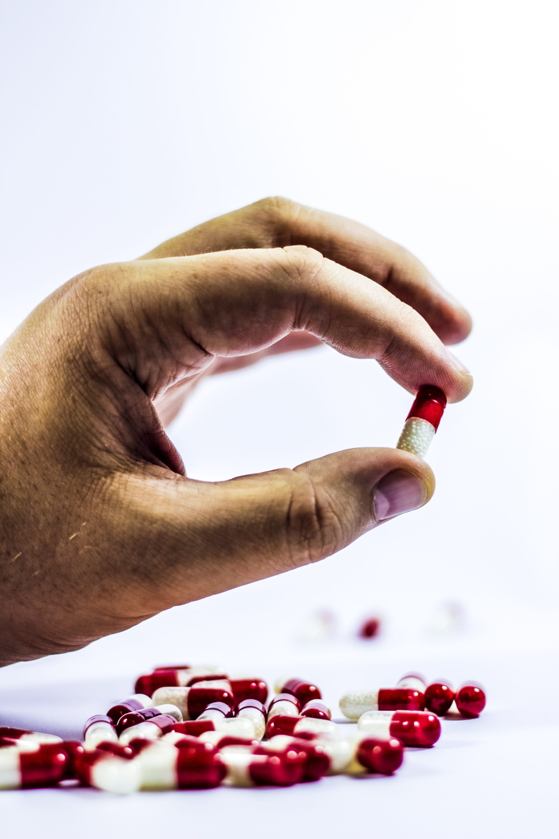 cold, food and drink, large group of objects, hand, drug, prescription, human body part, holding, get sick, tablets, capsule, overdose, the hand, human hand