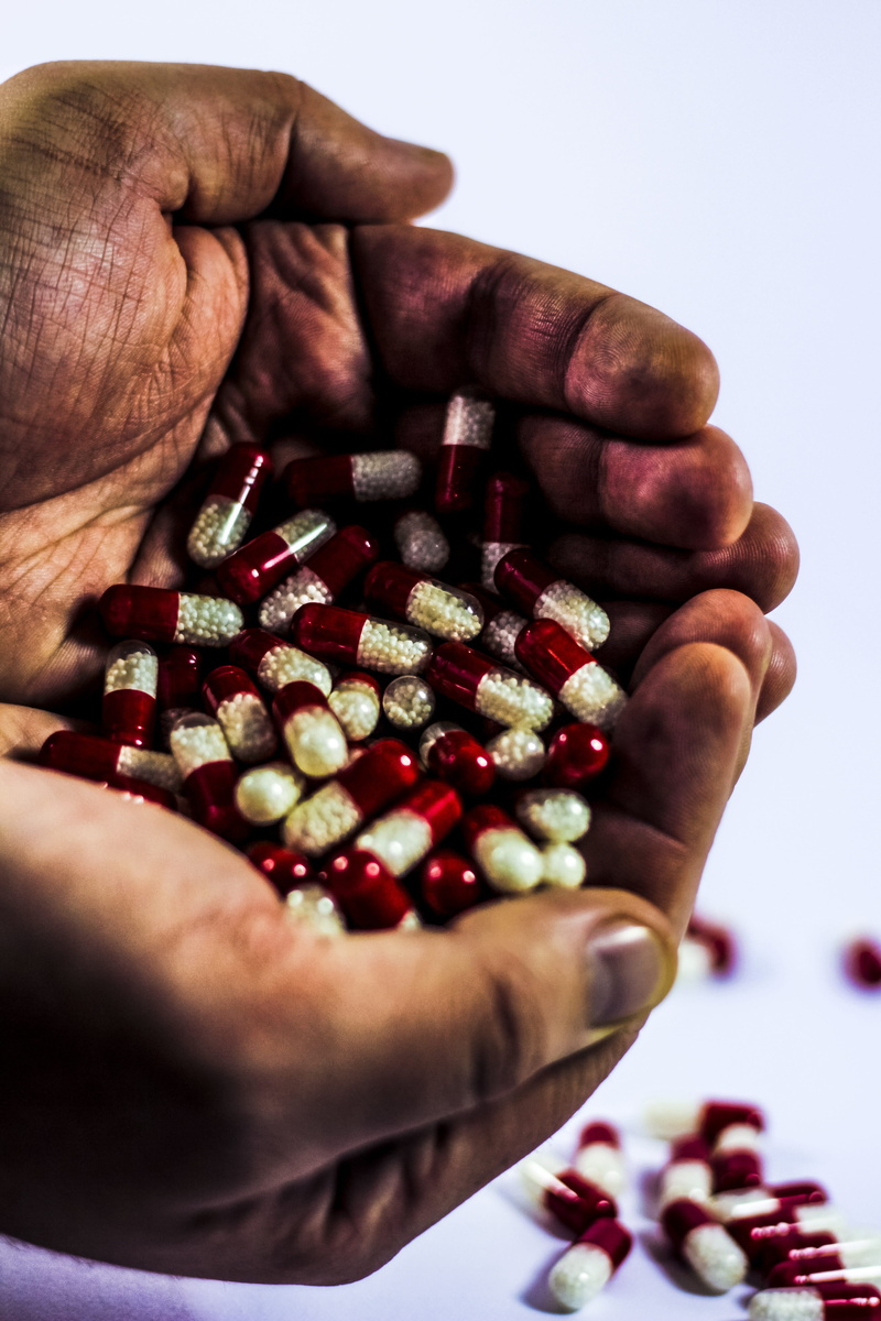 red, sick, food, the hand, pharmacy, selective focus, medical, real people, finger, human hand, drug, pharmacologist, human body part, treat yourself, indoors