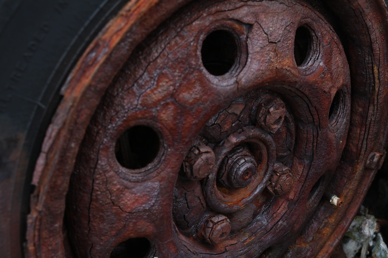 rim, workshop, destroyed, ornate, geometric shape, vehicle, shape, decline, close-up, scrap, 5K, stainless, animal head, animal body part, no people, rusty