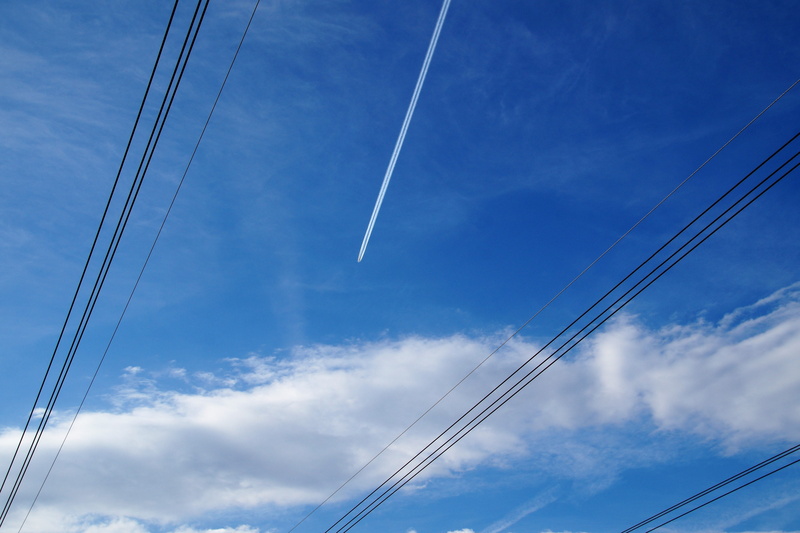 air vehicle, beauty in nature, fuel and power generation, no people, electricity, technology, low angle view, parallel, wires, aircraft, contrail, heaven