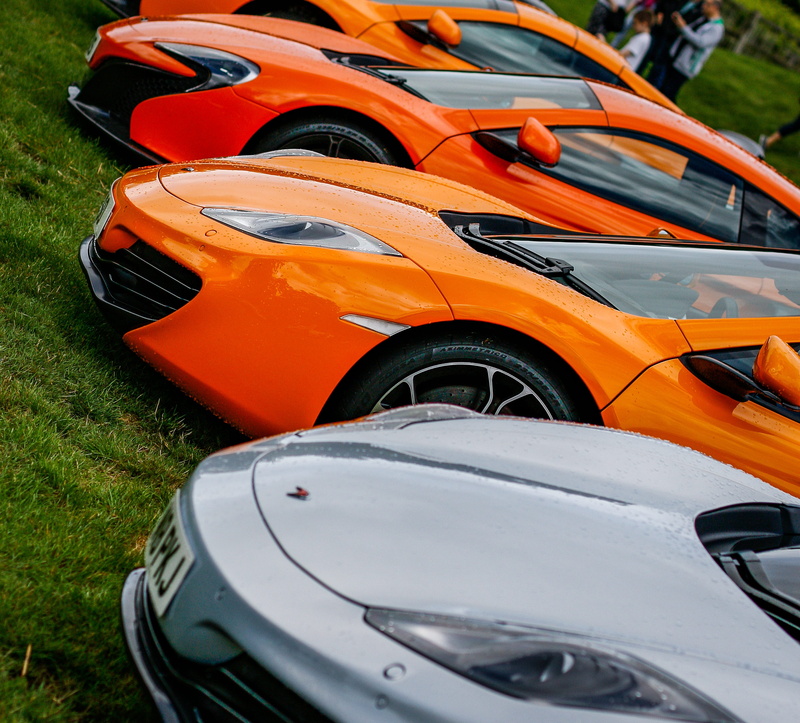 luxury, mp4-12c, focus on foreground, 2K, field, high angle view, land vehicle, sports car, automotive, outdoors, vehicle breakdown, mclaren 12c, mode of transportation