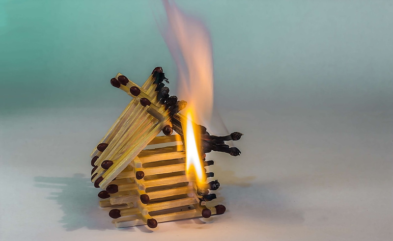 close-up, colored background, focus on foreground, heat - temperature, overarching flames, nature, motion, matches, hot, burning matchstick house, heat