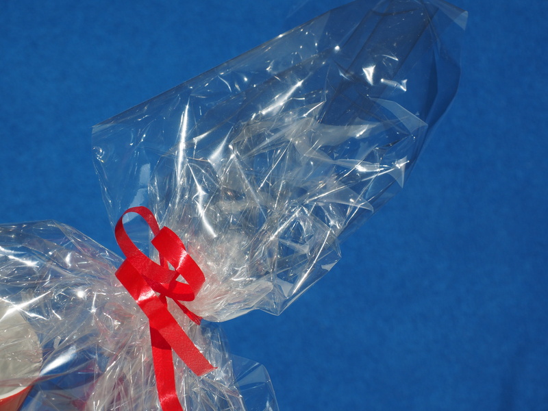 celebration, plastic, studio shot, cellulose, winter, sky, cellophane, transparent, pack, day, holding, colored background, gift ribbon, cellophangriff