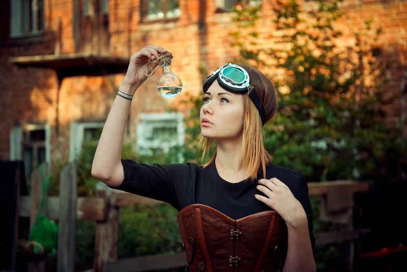 green eyes, goggles, corset, black dress, blonde, depth of field, test-tube, black clothing, steampunk, women, 2K, portrait