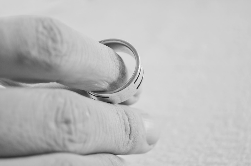 human body part, decisions, silver, beginning, sitting, selective focus, focus on foreground, divorce, holding, marriage, leisure activity, together, healthcare and medicine