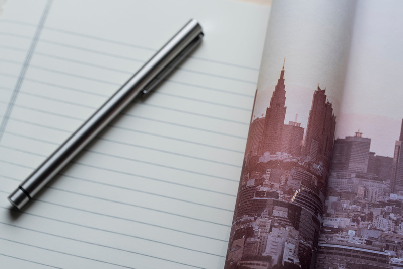 built structure, writing, architecture, business, note pad, open, page, table, publication, still life, indoors, pencil, no people, print, diary, high angle view