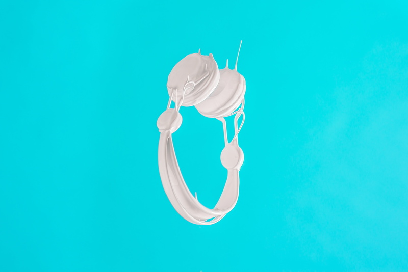 no people, studio shot, water, indoors, blue background, minimalism, energy efficient, headphones, single object, colored background, turquoise colored