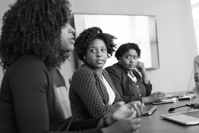 adult, meeting, girls, indoors, business, listening, communication, discussion, interaction, group, education, school, desk, computer, working, black-and-white