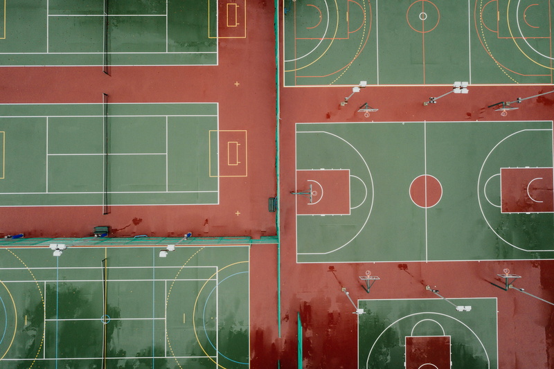 backgrounds, looking down, school, outdoors, keeping fit, metal, green color, basketball, stadium, tennis, education, full frame, red, courts, drone view