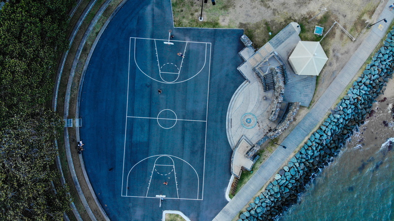 no people, plant, tennis court, day, chalk drawing, blue, communication, textile, drone, high angle view, team sport, aerial view, outdoors, redcliffe