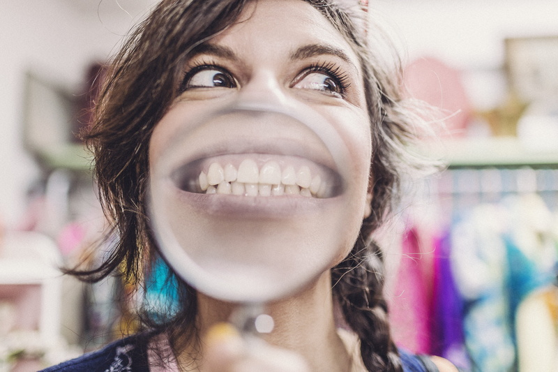 hairstyle, retail, glass, human body part, Teeth, young Adult, holding, one young woman only, girl, fashion, color Image, consumerism, happy, Woman, head And Shoulders
