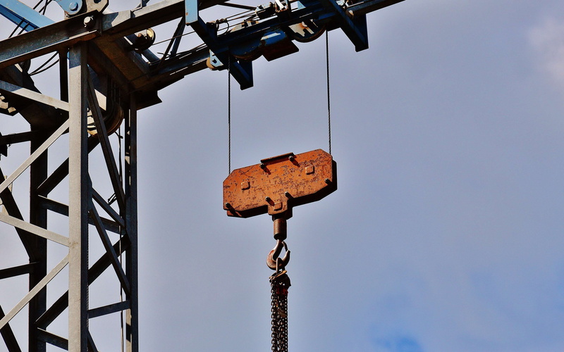 development, house construction, machinery, low angle view, construction work, pulley, construction industry, rusty, sky, build, construction site, technology