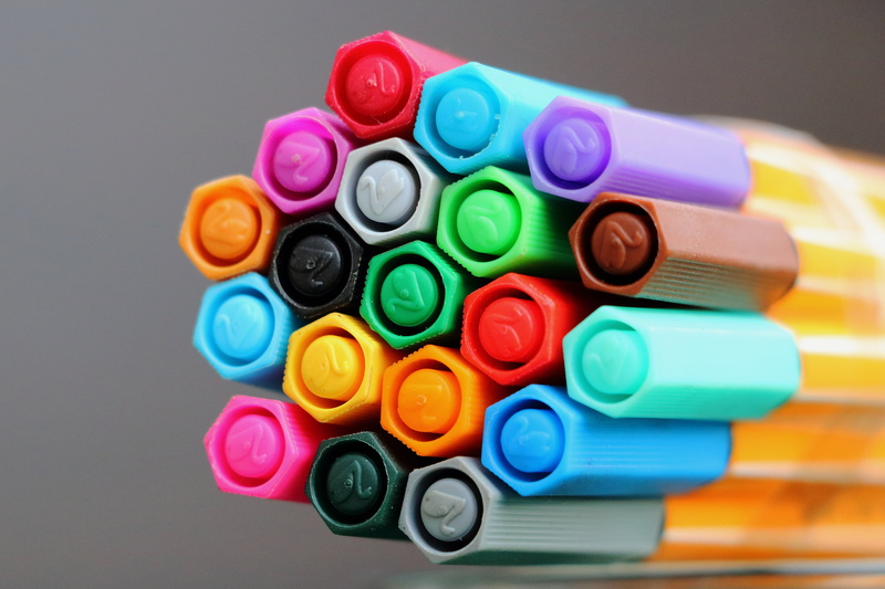writing instrument, blue, abundance, indoors, colorful, collection, no people, color, close-up, table, different colored crayons, large group of objects