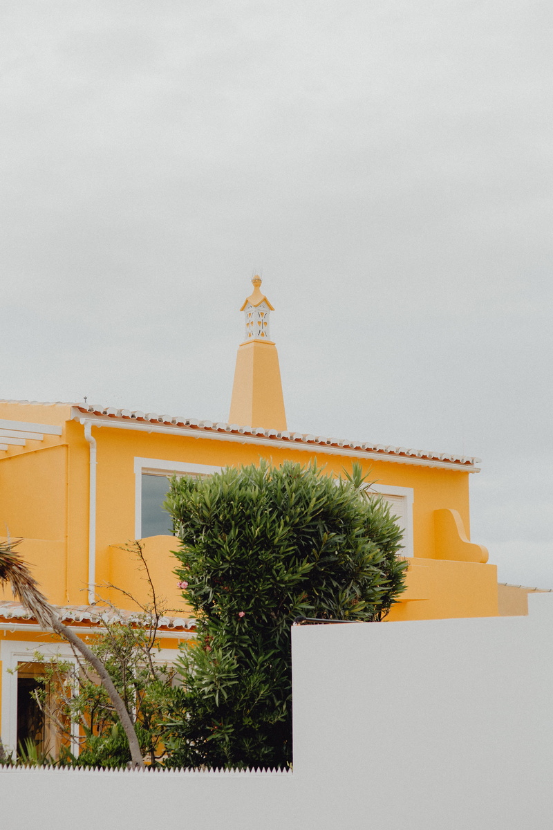spire, spirituality, tree, day, low angle view, algarve, facade, houses, place of worship, no people, belief, portugal, clear sky, architecture, design