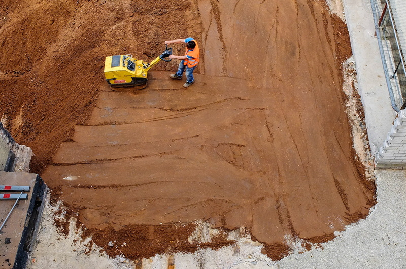 outdoors, high angle view, occupation, men, day, land, industry, civil engineering, transportation, sand, mode of transportation, 2K, activity, earth