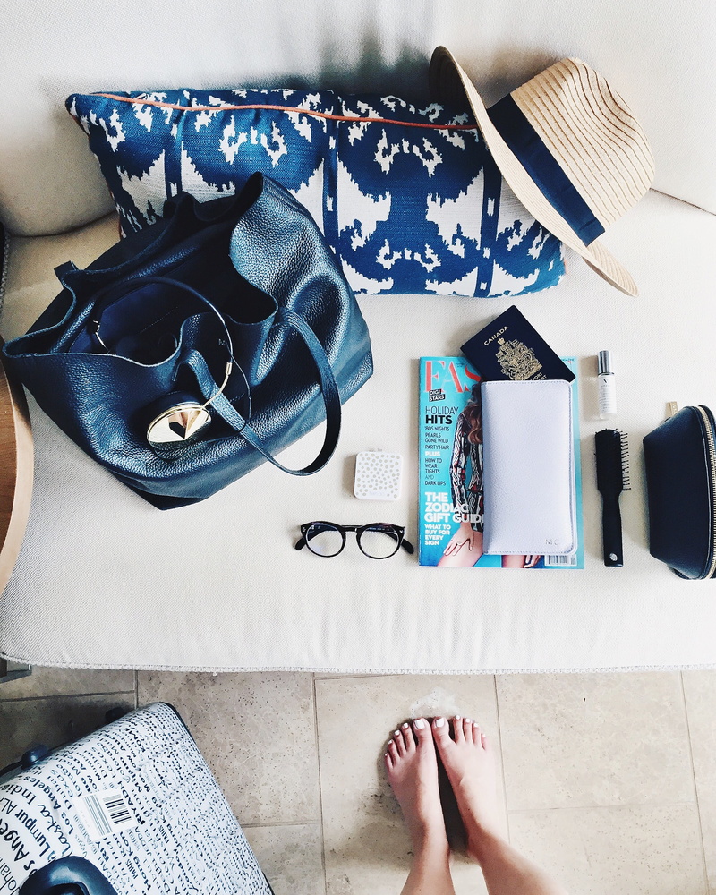 standing, bag, nail, leisure activity, hat, passport, accessory, barefoot, human leg, directly above, pillow, sock, wallet, human limb, high angle view