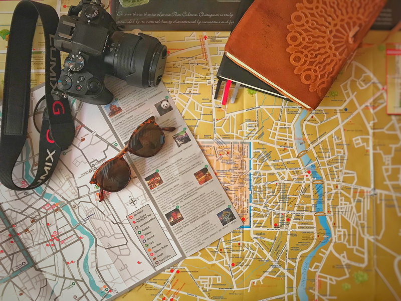 cartography, streets, preparation, table, art and craft, geography, communication, high angle view, sunglasses, lumix, complexity, chiang mai, vacation
