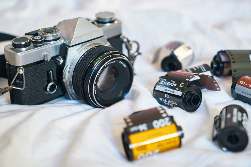 lens - eye, travel, photography themes, holiday, retro styled, negative, gray, focus on foreground, slr camera, selective focus, technology, photographing