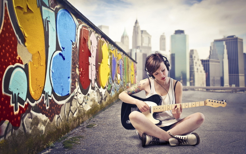 young Adult, females, outdoors, street, guitar, old-fashioned, happiness, adolescence, 2K, brunette, built structure, one Person, casual Clothing, young Women