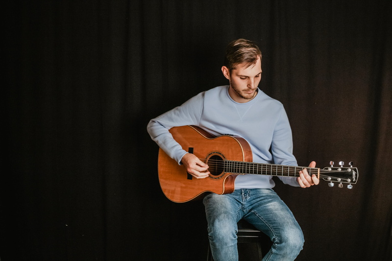 three quarter length, skill, plucking an instrument, lute, young adult, guitar, denim, 5K, human, artist, clothing, string instrument, leisure activities