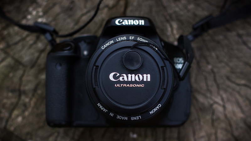 modern, high angle view, camera - photographic equipment, communication, camera, number, dslr, push button, no people, photographic equipment, digital camera