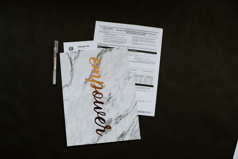 no people, newspaper, western script, black color, wall, communication, papers, tax, publication, employer, empower, paperwork, forms, business, finance